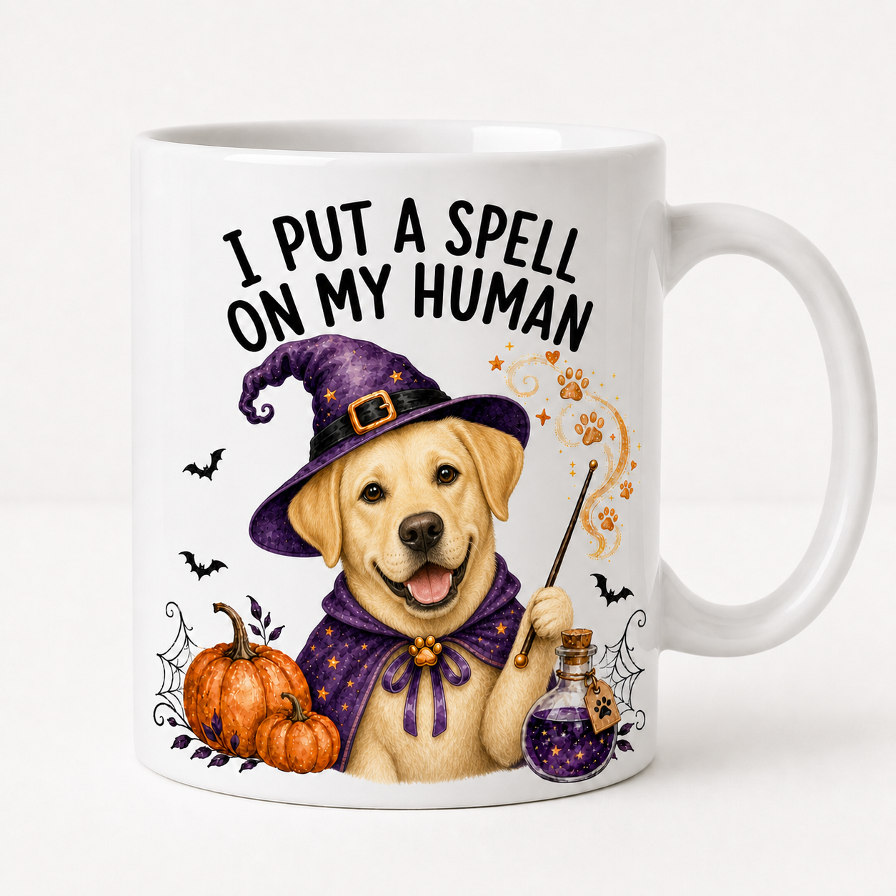 Yellow Labrador Halloween ceramic mug with I Put a Spell on My Human witch design