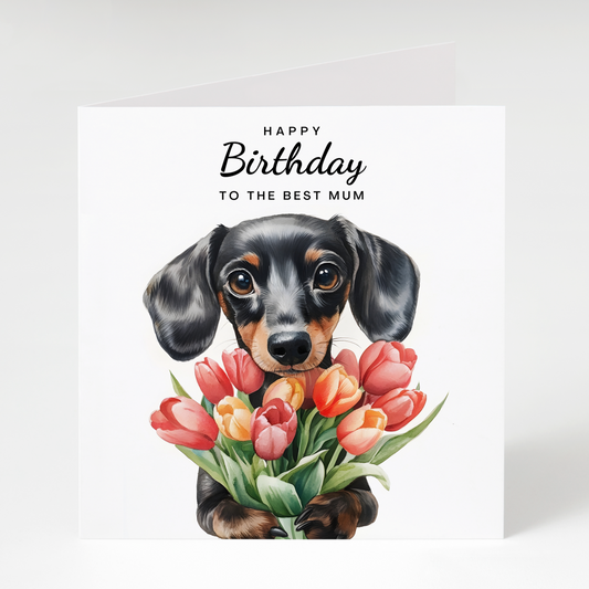 Birthday card with a dachshund holding flowers and text 'Happy Birthday to the best mum' on a white background.
