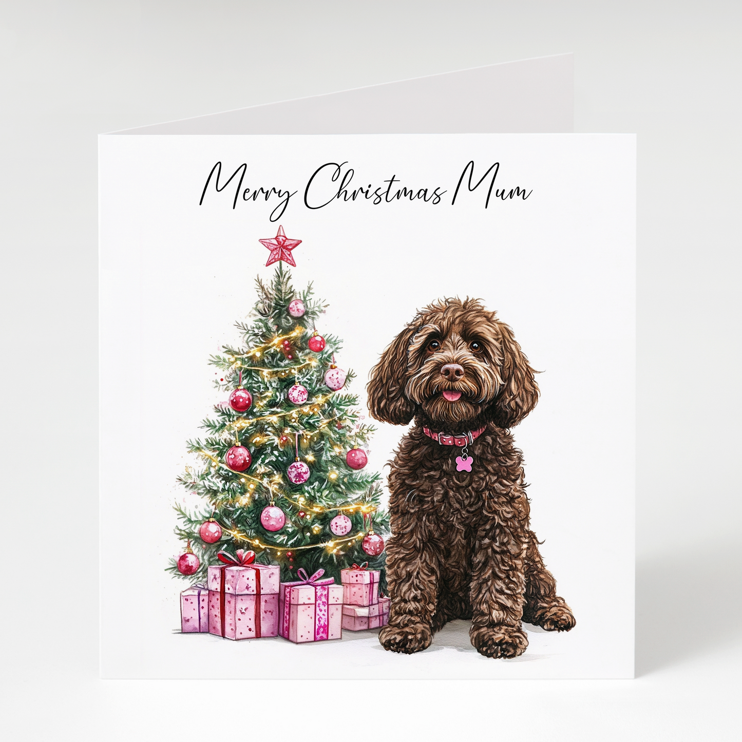 Christmas card for mum with a brown cockapoo next to a decorated tree on a white background