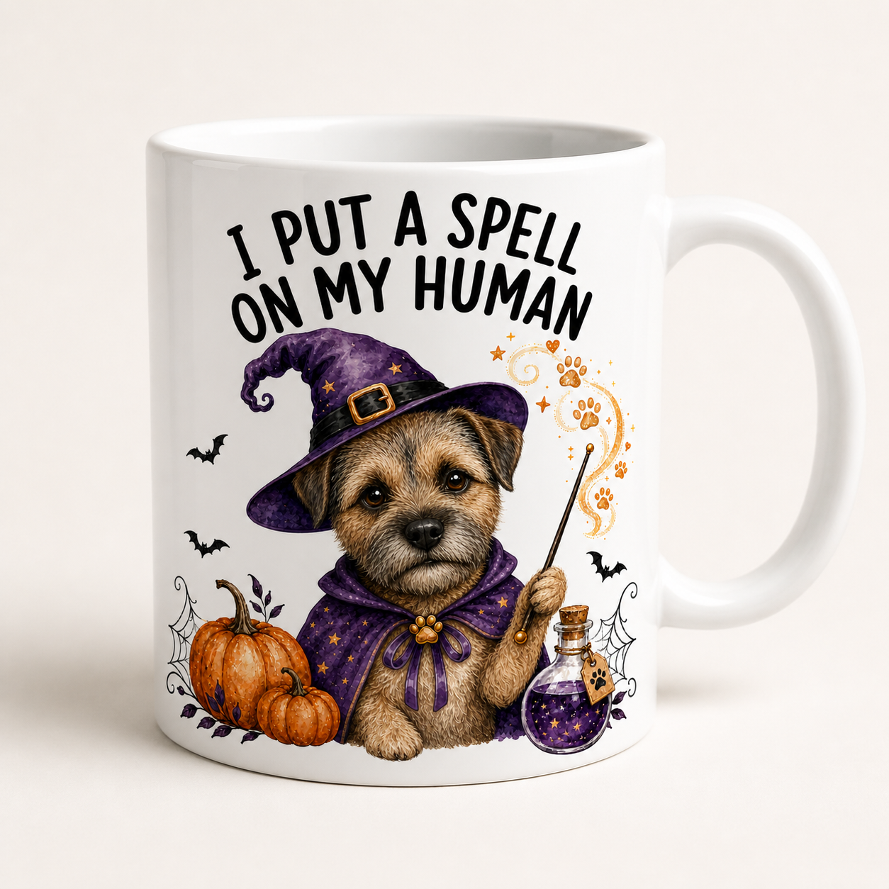 Border Terrier Halloween ceramic mug with I Put a Spell on My Human witch design